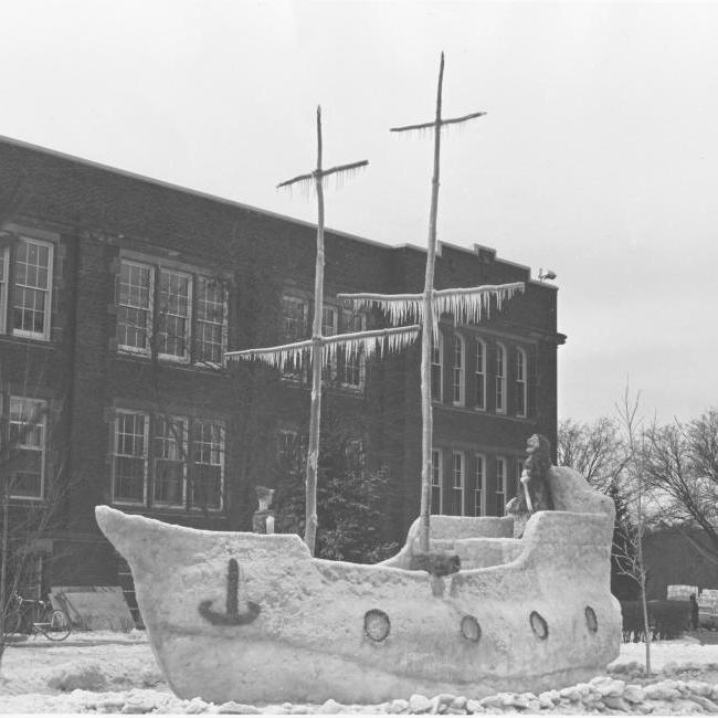 black and white image of snow sculpture outside Schofield Hall 